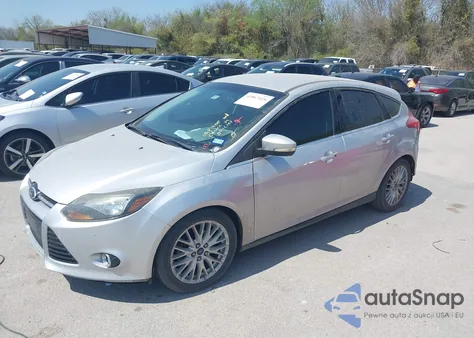 2014 Ford Focus Titanium from USA, damaged, VIN 1FADP3N22EL253809